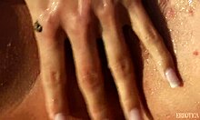 Stunning Blonde Posing Seductively on a Sandy Beach Shore