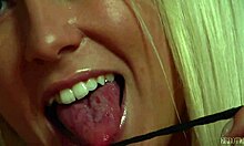 Blonde model in stockings poses naked, teasing the camera