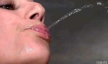 Young cute girl smiles as she shaves her legs