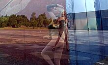 Dominatrix blonde reveals her pussy emotions by the wall