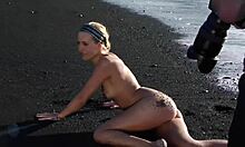 naughty blonde doin’ sexy poses on beach… damn she fine!