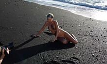 naughty blonde doin’ sexy poses on beach… damn she fine!