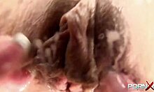 Redhead gets fisted hard by girlfriend on table!