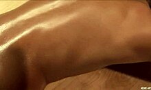 Oily Amateur Beauty with Long Legs Poses and Rolls on the Floor.