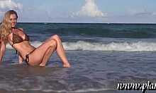 Blond-Haired Babe Posing Seductively on Beach