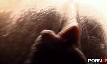 Redhead gets fisted hard by girlfriend on table!