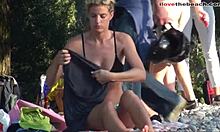 Blonde Milf Flaunts Big Tits Topless on Sunny Beach