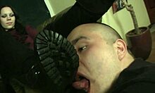 Yo, check this leggy brunette getting her boots licked clean right now! 😜