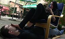 Dark-haired girlfriend dominates with divine feet over his face