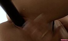 Jennifer Love passionately fucks her pussy with huge black toy