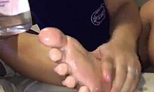 crystina rossi uses her oily feet to stroke that bbc in pov