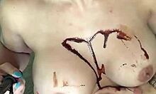 Does dude lick chocolate syrup off Crystina Rossi's boobs?