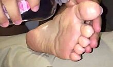 crystina rossi uses her oily feet to stroke that bbc in pov