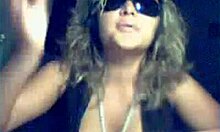 shades-wearing busty milf amateur reveals her figure in dress and panties