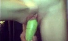 Kinky amateur fucks tight pussy with vegetable.