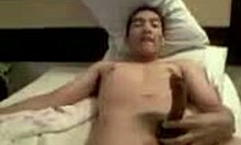 Hairy pussy hoe riding massive dong on cam