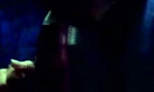 tanned brunette strips and shows big tits