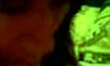 The brunette housewife eagerly sucks a big cock on her homemade bed.