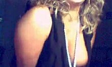 shades-wearing busty milf amateur reveals her figure in dress and panties