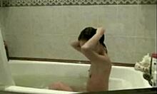 Худенькая вебкам-модель дразнит идеальной жопой в душе