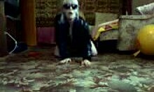 Boots-wearing amateur strips solo on webcam with glasses on