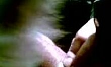 Dark-Haired Girl Enjoys Oral in Winter Coat