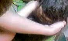 dark-haired amateur playfully sucking hot dick with long hair