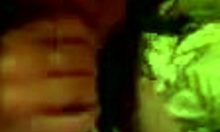 The brunette housewife eagerly sucks a big cock on her homemade bed.