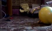 Boots-wearing amateur strips solo on webcam with glasses on