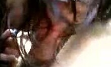 brunette milf blows outdoors naughtily