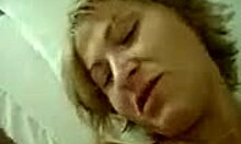 short-haired milf blonde sucks and masturbates big tits