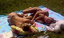 Look at these two slutty girlfriends sunbathing topless on the beach!
