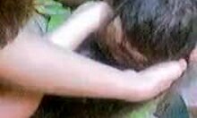 dark-haired amateur playfully sucking hot dick with long hair