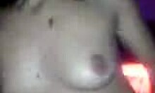 Short-Haired Brunette Strips Pale Tits On Cam