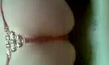 Mature slut in red thong finger-blasting on all fours