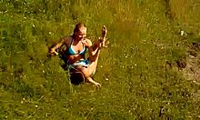 blond-haired amateur in cute bikini shows off outdoors