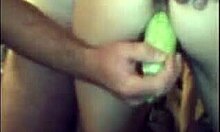 Kinky amateur fucks tight pussy with vegetable.