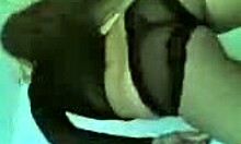 blonde milf in lingerie dances enticingly on cam.