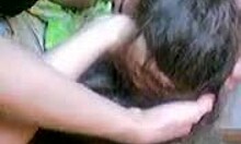 dark-haired amateur playfully sucking hot dick with long hair