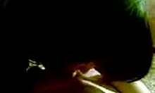 dark-haired hottie deepthroating cock on cam with handjob