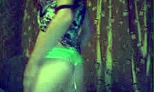 Look at this teen stripping her green panties and bra