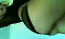 blonde milf in lingerie dances enticingly on cam.