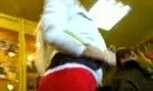 Blonde hottie in fishnets flashes upskirt