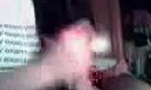 Brunette wife boldly blows and strokes cock like a professional in homemade scene.