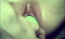 Kinky amateur fucks tight pussy with vegetable.