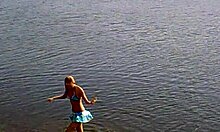 blond-haired amateur in cute bikini shows off outdoors