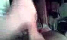 Brunette wife boldly blows and strokes cock like a professional in homemade scene.