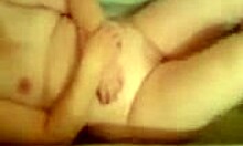 Plump Woman Reveals Curves and Rolls in Bathtub