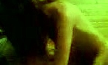 Dark-Haired Asian Riding Big Cock