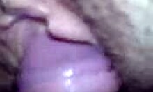 Brunette wife riding close-up on big bed